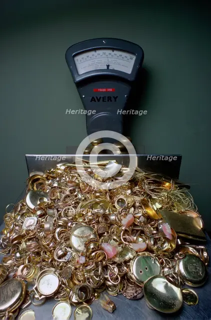 Weighing gold scrap, Hatton Garden, London.  Creator: Tony Evans.