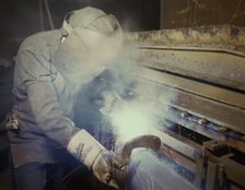 Welder making boilers for a ship, Combustion Engineering Co., Chattanooga, Tenn., 1942. Creator: Alfred T Palmer