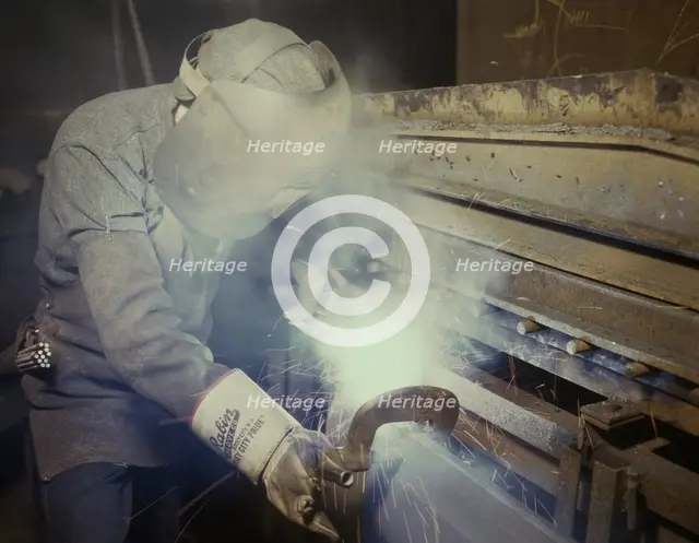 Welder making boilers for a ship, Combustion Engineering Co., Chattanooga, Tenn., 1942. Creator: Alfred T Palmer.