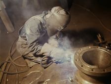 Welder making boilers for a ship, Combustion Engineering Co., Chattanooga, Tenn., 1942. Creator: Alfred T Palmer