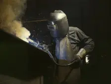 Welder making boilers for a ship, Combustion Engineering Co., Chattanooga, Tenn., 1942. Creator: Alfred T Palmer