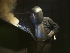 Welder making boilers for a ship, Combustion Engineering Co., Chattanooga, Tenn., 1942. Creator: Alfred T Palmer