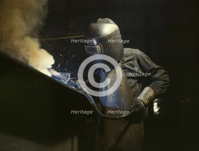 Welder making boilers for a ship, Combustion Engineering Co., Chattanooga, Tenn., 1942. Creator: Alfred T Palmer.