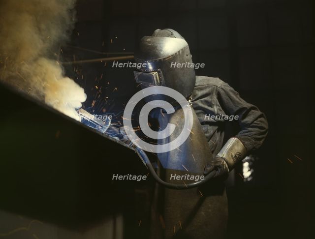 Welder making boilers for a ship, Combustion Engineering Co., Chattanooga, Tenn., 1942. Creator: Alfred T Palmer.
