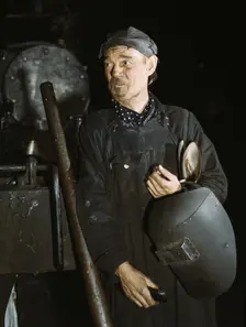 Welder at the C & NW RR locomotive shops, 40th Street shops, Chicago, Ill., 1942. Creator: Jack Delano