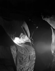 Welding a dragline bucket, Edgar Allen Steel Co, Sheffield, South Yorkshire, 1962. Creator: Michael Walters