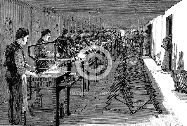 Welding bicycle frames in an American factory, 1900. Creator: Unknown.