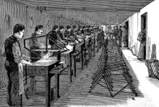 Welding bicycle frames in an American factory, 1900. Creator: Unknown