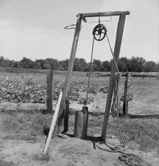 Well, Center County, Oklahoma, belonging to tenant farmer, 1937. Creator: Dorothea Lange