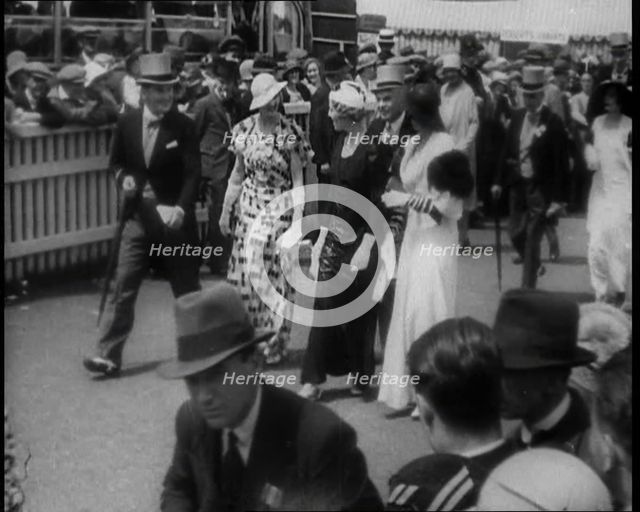 Well Dressed Men and Women at a Race Meeting, 1933. Creator: British Pathe Ltd.