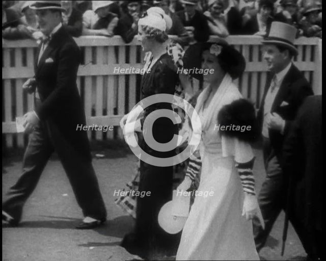 Well Dressed Men and Women at a Race Meeting, 1933. Creator: British Pathe Ltd.
