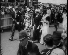 Well Dressed Men and Women at a Race Meeting, 1933. Creator: British Pathe Ltd