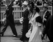 Well Dressed Men and Women at a Race Meeting, 1933. Creator: British Pathe Ltd