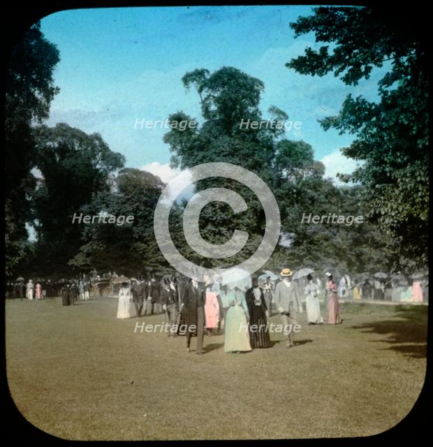 Well dressed ladies and gentlemen attending a sports day...Eton College,  Windsor, 1889. Creator: Henry Taunt.