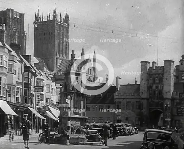 Wells Cathedral and Market Cross, Wells, Somerset, 1942.  Creator: British Pathe Ltd.