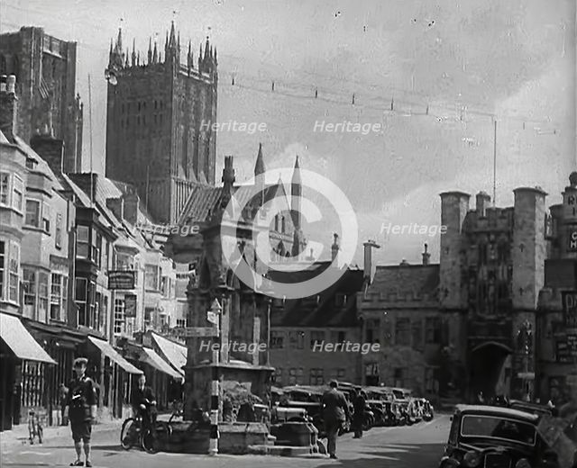 Wells Cathedral and Market Cross, Wells, Somerset, 1942.  Creator: British Pathe Ltd.