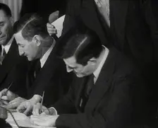 Wendell Willkie Signing an Agreement Allowing the USA to use British Naval Bases..., 1941. Creator: British Pathe Ltd