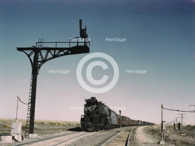 West bound Santa Fe R.R. freight train waiting in a siding..., Ricardo, New Mexico, 1943. Creator: Jack Delano.