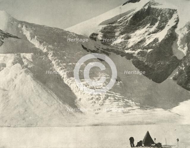 'Western Party's camp on December 28 below a hanging glacier at the Cathedral rocks', 1909. Artist: Unknown.