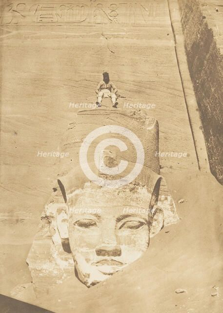 Westernmost Colossus of the Temple of Re, Abu Simbel, 1850. Creator: Maxime du Camp.