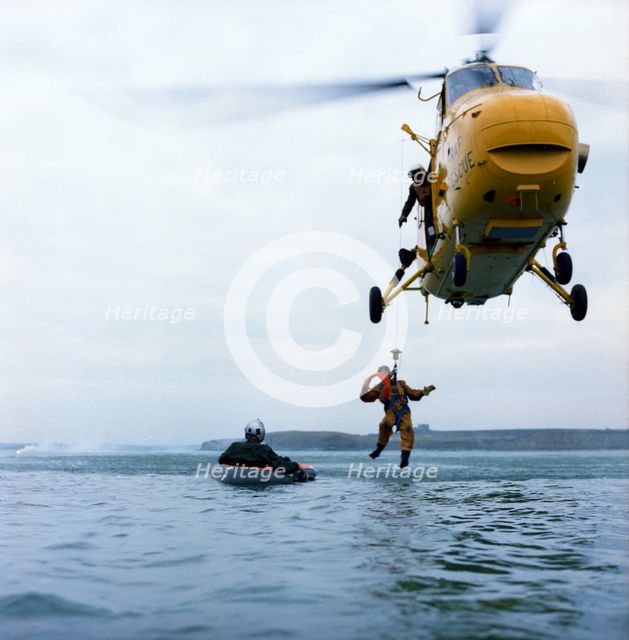 Westland Whirlwind helicopter making a rescue, 1973. Creator: Michael Walters.