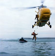 Westland Whirlwind helicopter making a rescue, 1973. Creator: Michael Walters