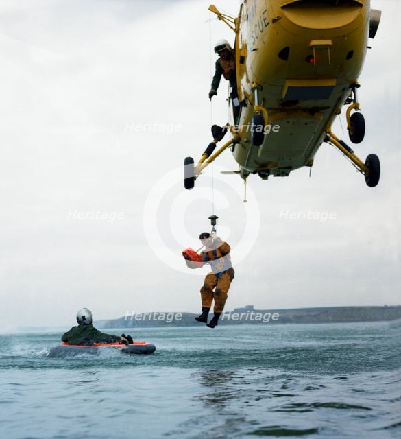 Westland Whirlwind helicopter making a rescue, 1973. Creator: Michael Walters.