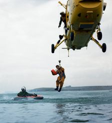 Westland Whirlwind helicopter making a rescue, 1973. Creator: Michael Walters