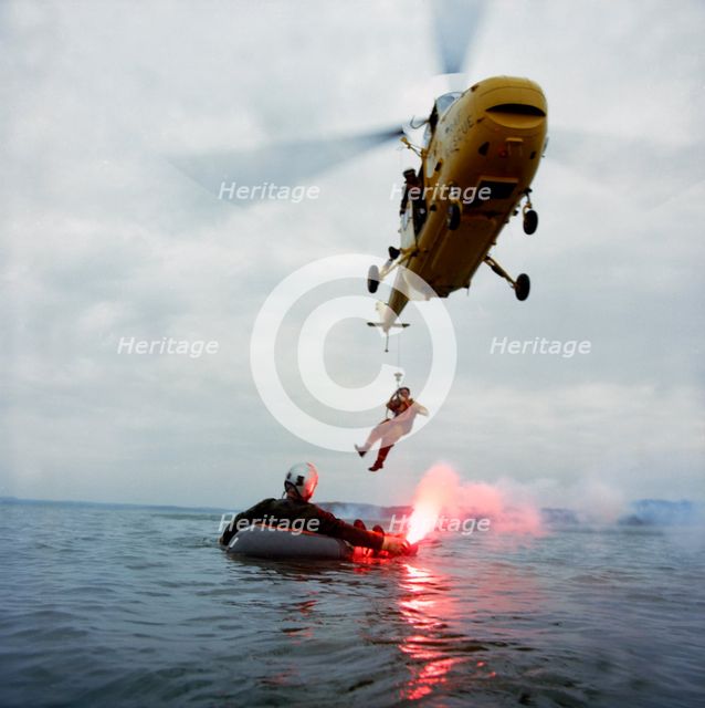 Westland Whirlwind helicopter making a rescue, 1973. Creator: Michael Walters.