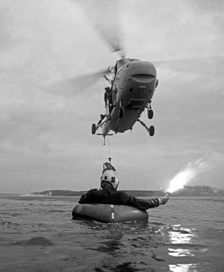 Westland Whirlwind helicopter making a rescue, 1973. Creator: Michael Walters