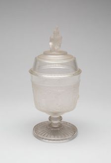 Westward Ho!/Pioneer pattern covered sugar bowl, c. 1876. Creator: Gillinder & Sons