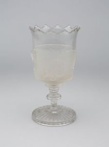 Westward Ho!/Pioneer pattern goblet on pedestal, c. 1876. Creator: Gillinder & Sons