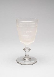 Westward Ho!/Pioneer pattern goblet (fourth of a set of four), c. 1876. Creator: Gillinder & Sons