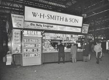 WH Smith's bookstall at Waterloo Station, Lambeth, London, 1960