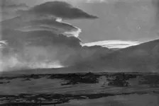 Whaleback Clouds Over Mount Erebus c1910–1913, (1913). Artist: Herbert Ponting
