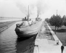 Whaleback entering Weitzel Lock, Sault Sainte Marie, Mich., between 1900 and 1910. Creator: Unknown