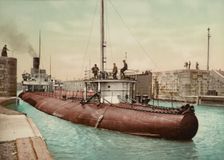 "Whaleback" leaving Poe Lock, Sault Ste. Marie, Michigan, c1899. Creator: Unknown