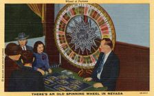 Wheel of Fortune. There's an Old Spinning Wheel in Nevada postcard, 1940