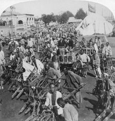 Wheelbarrow transportation at the boat landing Tientsin (Tianjin), China, 1901. Artist: Underwood & Underwood
