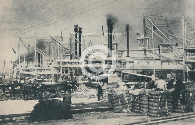 'When Cotton Was Loaded, a forest of derricks and smoke-stacks', 1937. Artist: Unknown.