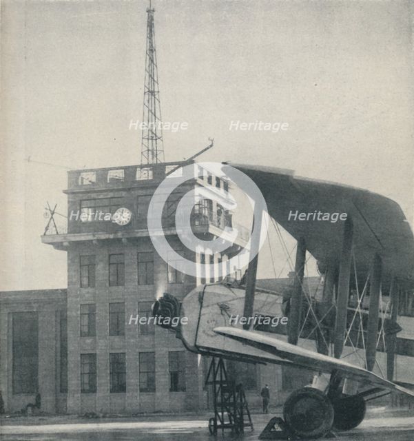 'Where Officers of a Great Aerodrome Keep Contact with the Flying Pilots', c1935. Artist: Unknown.