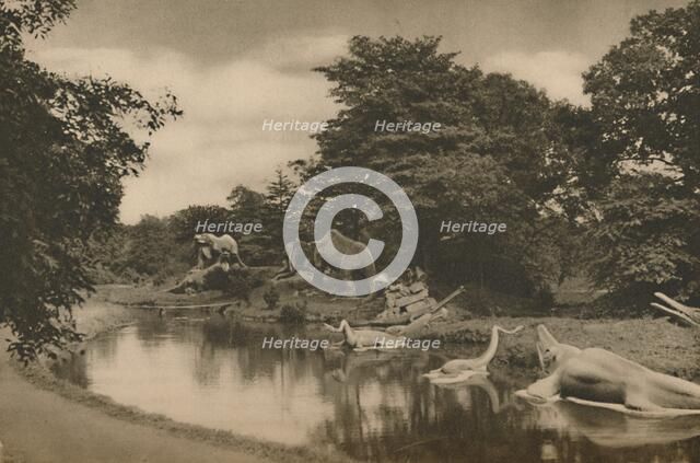 'Where the Beasts of Prehistory Lurk By the Lake in the Palace Grounds', c1935. Creator: Unknown.
