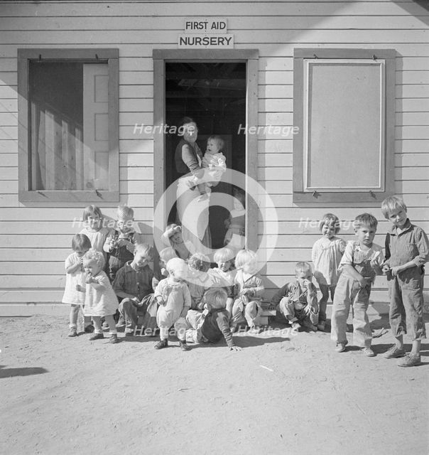 While the mothers are working in the fields, the preschool children..., Kern migrant camp, 1936. Creator: Dorothea Lange.