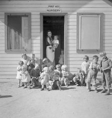 While the mothers are working in the fields, the preschool children..., Kern migrant camp, 1936. Creator: Dorothea Lange