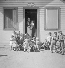 While the mothers are working in the fields, the preschool children..., Kern migrant camp, 1936. Creator: Dorothea Lange