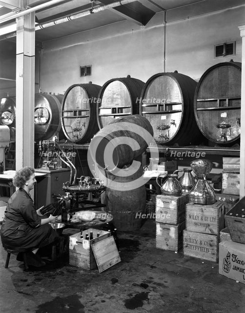 Whisky blending at Wiley & Co, Sheffield, South Yorkshire, 1960. Creator: Michael Walters.