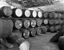 Whisky in barrels at a bonded warehouse, Sheffield, South Yorkshire, 1960. Artist: Michael Walters