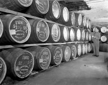 Whiskey blending at Wiley & Co, a Sheffield bonded warehouse, South Yorkshire, 1960. Creator: Michael Walters