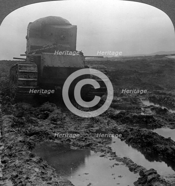 Whippet tank on a muddy battlefield, Morcourt, France, World War I, 1918.Artist: Realistic Travels Publishers