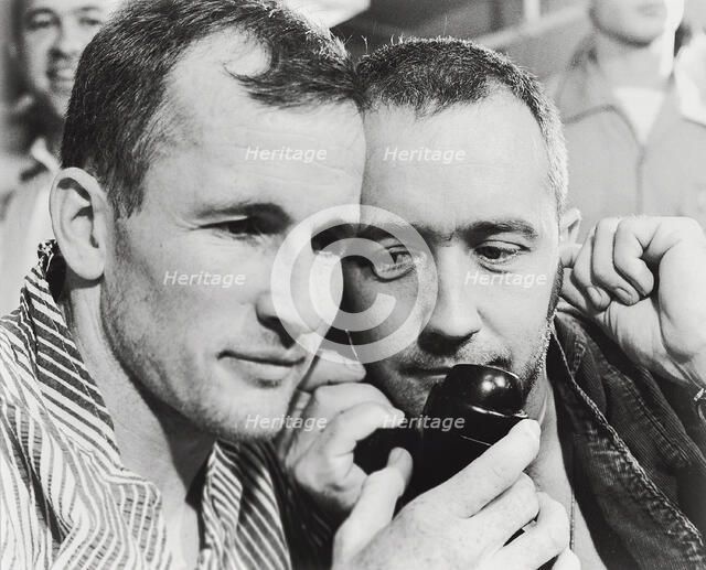 White and McDivitt talk to President Lyndon B. Johnson, 1965.  Creator: NASA.